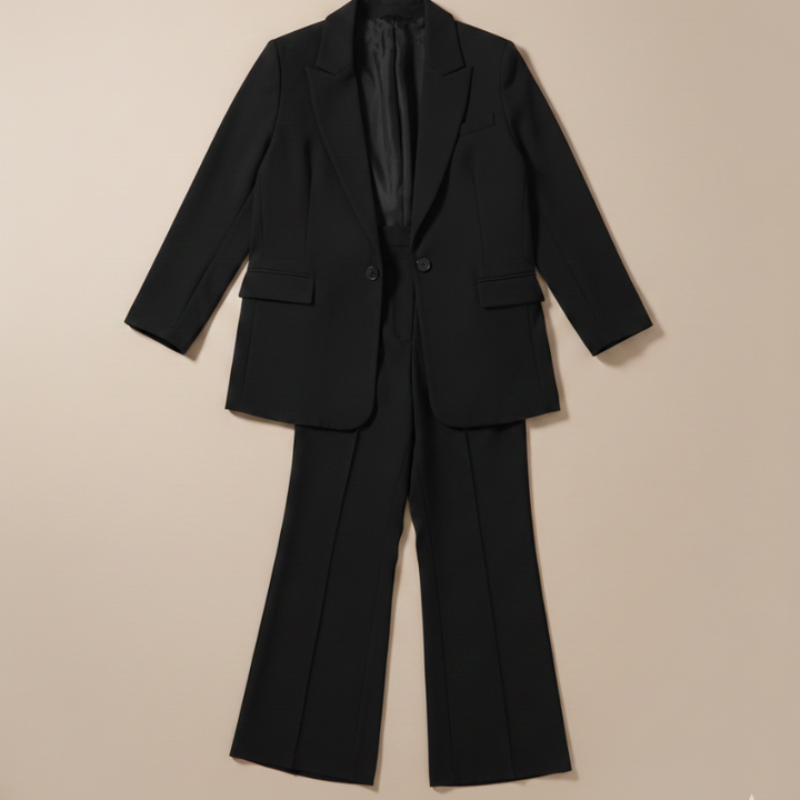 Back view of black blazer and trousers showing full silhouette