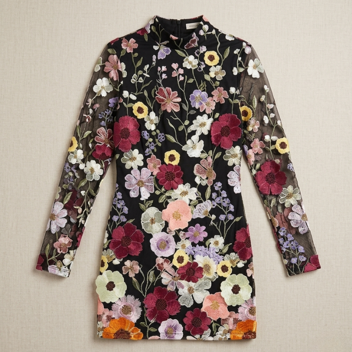 Floral dress with colorful flowers on a plain background
