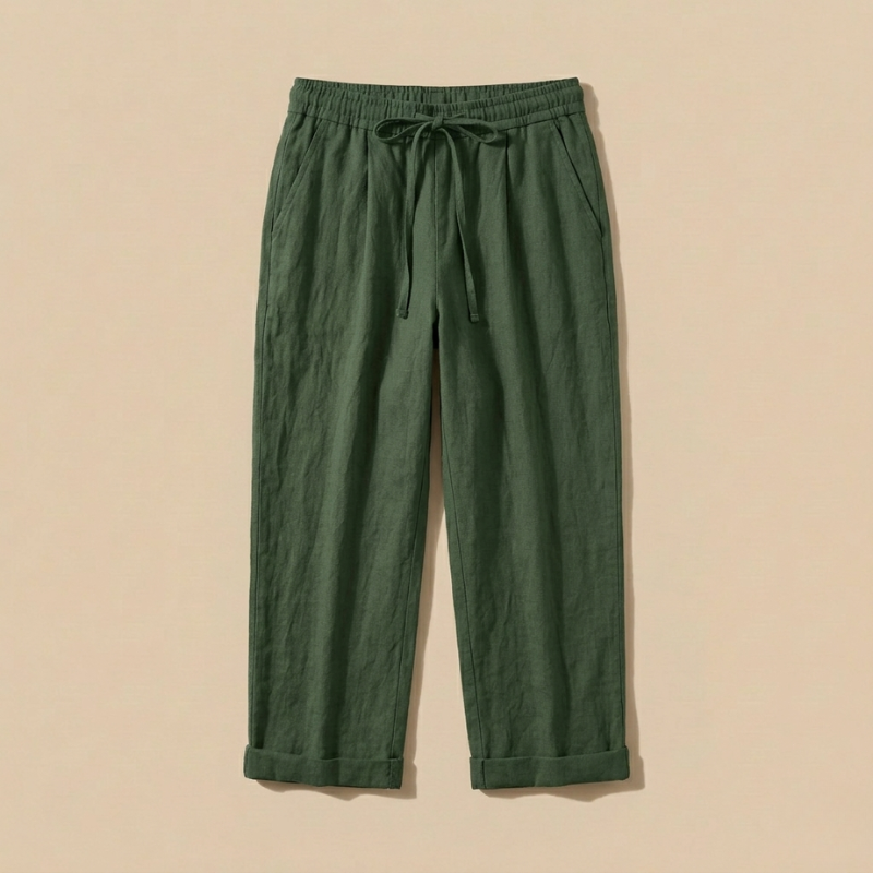 Green pants with a drawstring on a beige background